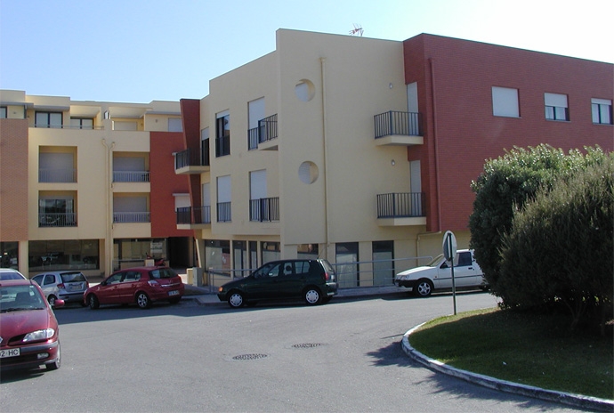Housing with shops and garages 